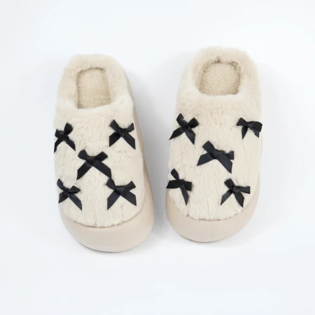 Жіночі домашні капці з бантиками у бежевому кольорі